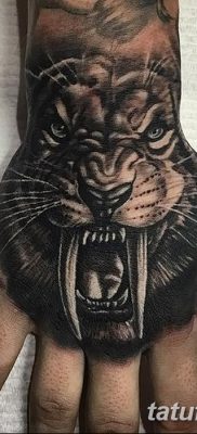 фото тату саблезубый тигр от 25.07.2017 №006 — Tattoo saber-toothed tiger