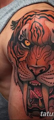 фото тату саблезубый тигр от 25.07.2017 №044 — Tattoo saber-toothed tiger