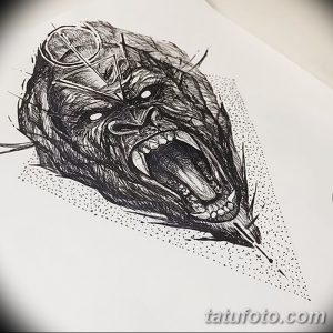 Фото эскиза татуировки рычащей гориллы, выполненного в графическом стиле с использованием черных линий и точек.