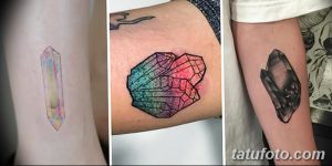 Фото тату на руке: три кристалла разных форм и цветов (радужный, розовый, черный), выполненные в реалистичной технике.