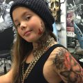 Арест в США за татуировку нанесенную на тело несовершеннолетней дочери - фото