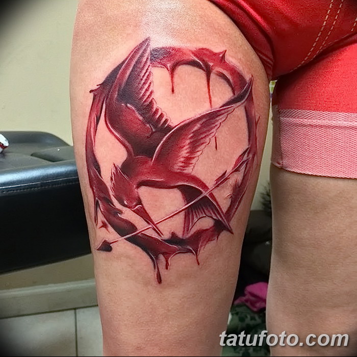 фото тату Сойка пересмешница от 25.09.2017 №045 - Tattoo Hunger Games - tatufoto.com