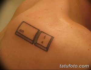 Фото тату с изображением клавиш Shift и $4 с клавиатуры. Небольшой и оригинальный рисунок татуировки.