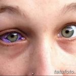 Фотография девушки с одним фиолетовым и одним серым глазом. Изображение демонстрирует необычный и привлекательный внешний вид.