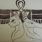 Фото тату анкха, головы кошки и головы шакала, выполненного в графическом стиле. Рисунок татуировки символизирует древнеегипетскую мифологию и духовную силу.