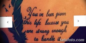 Фото тату на плече с надписью 'You've been given this life because you are strong enough'. Рукописный шрифт, позитивный смысл, мотивационный рисунок.