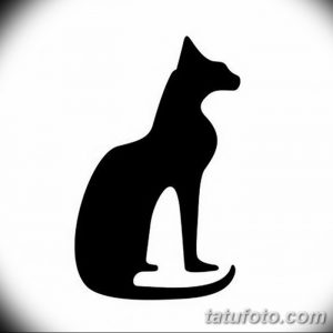 Черно-белый эскиз тату с изображением сидящей кошки в профиль. Стиль - минимализм, силуэт, графика. Идеально для любителей кошек и лаконичных татуировок.