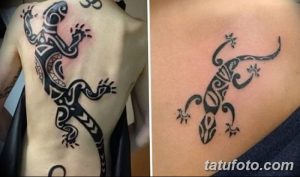 Фото тату игуаны в стиле трайбл на спине и животе. Черно-белый рисунок татуировки с геометрическими узорами и символами.