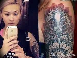 Детализированная татуировка на руке, выполненная в технике pointillism, изображающая стилизованный веер с геометрическими узорами.