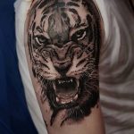 фото татуировка оскал тигра от 01.06.2018 №003 - tiger tattoo - tatufoto.com