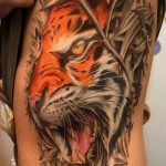 фото татуировка оскал тигра от 01.06.2018 №008 - tiger tattoo - tatufoto.com