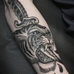 фото татуировка оскал тигра от 01.06.2018 №009 - tiger tattoo - tatufoto.com