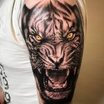 фото татуировка оскал тигра от 01.06.2018 №016 - tiger tattoo - tatufoto.com