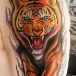 фото татуировка оскал тигра от 01.06.2018 №024 - tiger tattoo - tatufoto.com 2323
