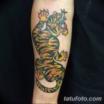 фото татуировка оскал тигра от 01.06.2018 №024 - tiger tattoo - tatufoto.com