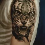 фото татуировка оскал тигра от 01.06.2018 №034 - tiger tattoo - tatufoto.com