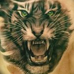 фото татуировка оскал тигра от 01.06.2018 №036 - tiger tattoo - tatufoto.com