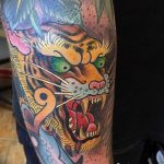 фото татуировка оскал тигра от 01.06.2018 №040 - tiger tattoo - tatufoto.com