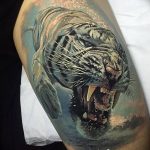 фото татуировка оскал тигра от 01.06.2018 №043 - tiger tattoo - tatufoto.com