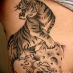 фото татуировка оскал тигра от 01.06.2018 №048 - tiger tattoo - tatufoto.com