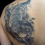 фото татуировка оскал тигра от 01.06.2018 №057 - tiger tattoo - tatufoto.com