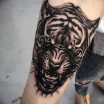 фото татуировка оскал тигра от 01.06.2018 №066 - tiger tattoo - tatufoto.com