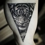 фото татуировка оскал тигра от 01.06.2018 №067 - tiger tattoo - tatufoto.com