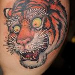 фото татуировка оскал тигра от 01.06.2018 №068 - tiger tattoo - tatufoto.com