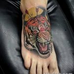 фото татуировка оскал тигра от 01.06.2018 №070 - tiger tattoo - tatufoto.com