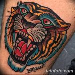 фото татуировка оскал тигра от 01.06.2018 №072 - tiger tattoo - tatufoto.com