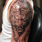 фото татуировка оскал тигра от 01.06.2018 №094 - tiger tattoo - tatufoto.com
