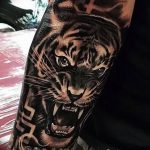 фото татуировка оскал тигра от 01.06.2018 №105 - tiger tattoo - tatufoto.com