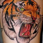 фото татуировка оскал тигра от 01.06.2018 №106 - tiger tattoo - tatufoto.com