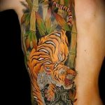 фото татуировка оскал тигра от 01.06.2018 №110 - tiger tattoo - tatufoto.com