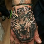 фото татуировка оскал тигра от 01.06.2018 №112 - tiger tattoo - tatufoto.com