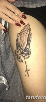rosary bead tattoo on bicep Praying hands tattoo Praying hands t