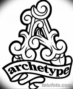 Фото тату: черно-белый рисунок с надписью 'archetype', выполненный в стиле трайбл с использованием завитков и геометрических узоров.