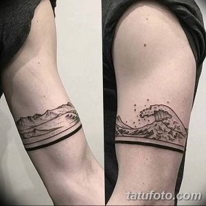 Фото тату: минималистичный рисунок волны и гор, выполненный в технике line work на предплечье. Четкие линии и лаконичный дизайн.