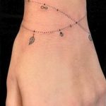 charm bracelet tattoos for wrist Elegant Bracelet tattoo with Ta