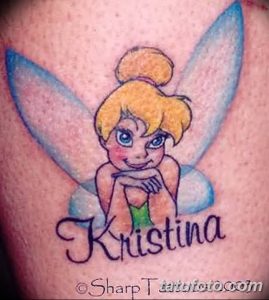 Фото тату феи Динь-Динь из мультфильма 'Питер Пэн' с именем 'Kristina'. Нежные пастельные тона и детализированная проработка.
