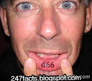 Фото татуировки с цифрой 666, нанесенной под языком. Экстремальная и провокационная татуировка.