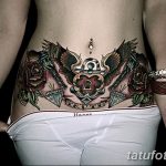 Фото тату на животе: красочный рисунок в стиле олдскул с розами, сердцем, замком и бриллиантами. Классический рисунок татуировки.