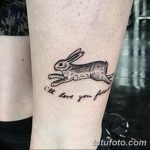 Фото тату с изображением прыгающего зайчика и надписью 'I'll love you forever', выполненное в черном цвете.