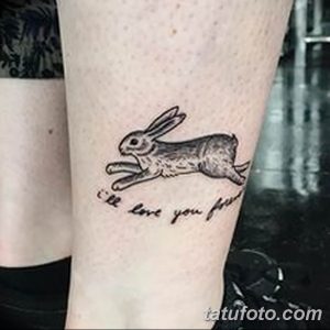 Фото тату с изображением прыгающего зайчика и надписью 'I'll love you forever', выполненное в черном цвете.
