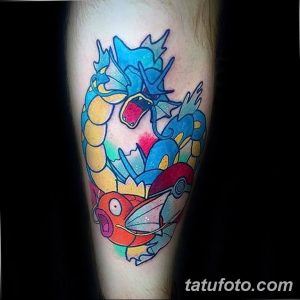 Фото тату на предплечье с изображением покемонов Magikarp и Gyarados в стиле аниме.