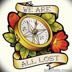 Фото тату: цветной компас в окружении красных роз и с лентами с надписями 'We Are All Lost'. Традиционный стиль татуировки.