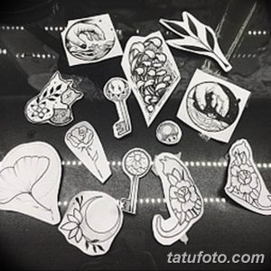 Фото тату: коллекция эскизов татуировок, включающая изображения кошек, ключей, цветов, сердец и других символических элементов. Разнообразные рисунки.