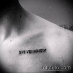 Фотография татуировки на ключице с римскими цифрами "XVI-VIII-MMXIV", выполненной черным цветом.