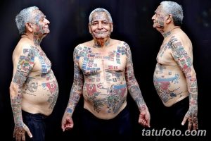 Фото тату на теле: изображение карты мира с портретами известных личностей и флагами разных стран, выполненное в ярких цветах.