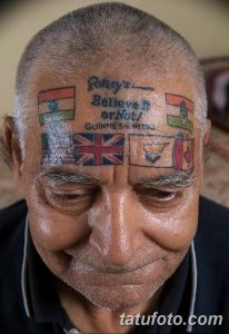 Фото тату на лице пожилого мужчины с флагами разных стран и надписью 'Ripley's Believe It or Not!'